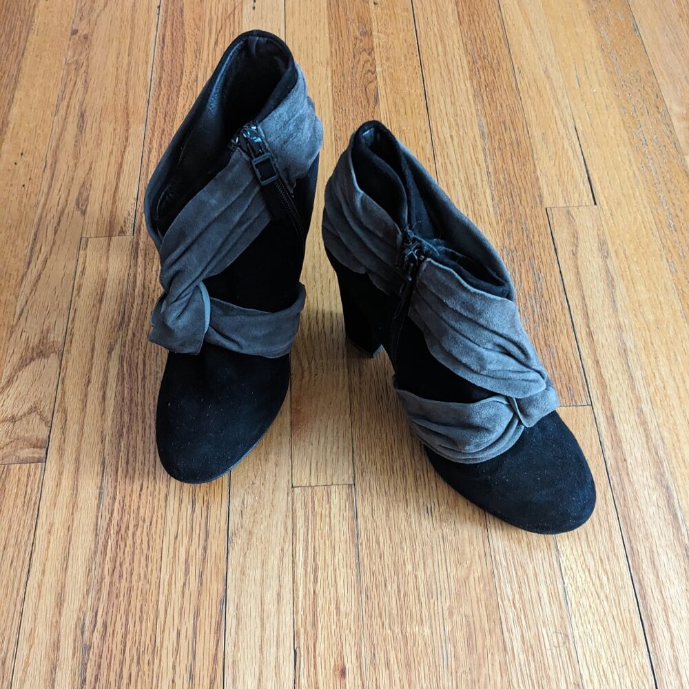 Black suede ankle boots with a grey wrap detail